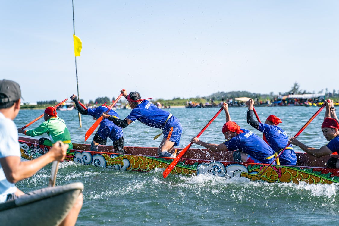 Dragon boat race with paddlers competing on the water